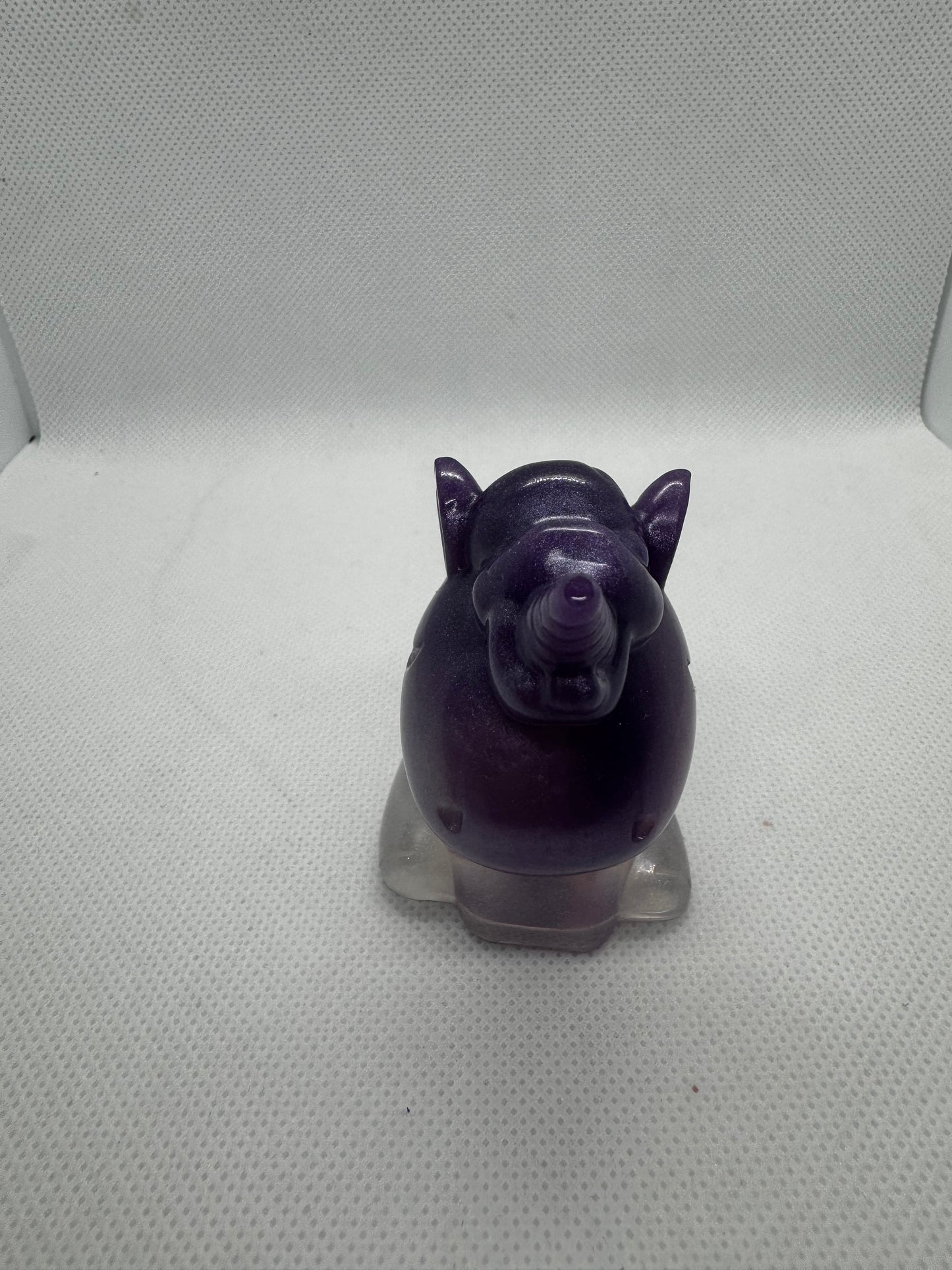 Licorne violet et blanc